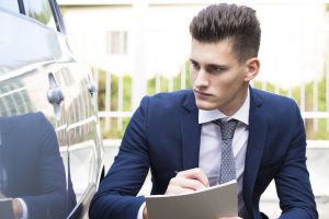 46355044 - beautiful young insurance agent watching car damaged